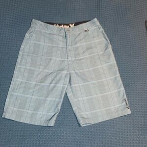 Hurley flex shorts. Sits on the knee. Size 28 waist. New.